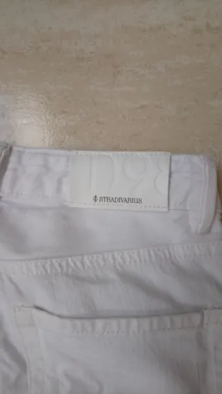 2 Pantalones vaqueros blanco y azul chica.