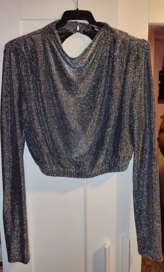 Top de brillo y manga larga