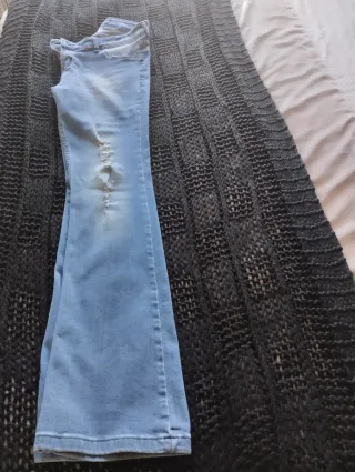 Vaqueros campana desgastados
