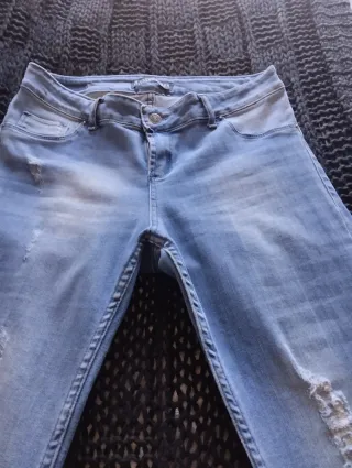 Vaqueros campana desgastados