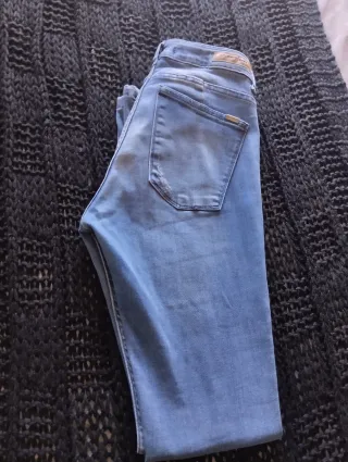 Vaqueros campana desgastados