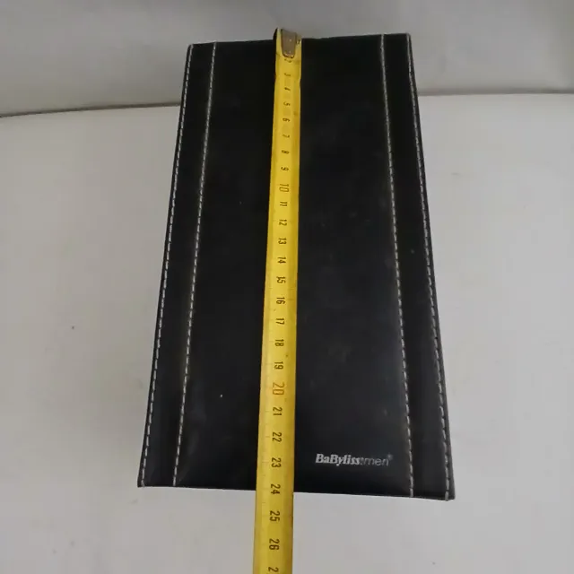 Astuccio in pelle nera con cuciture bianche