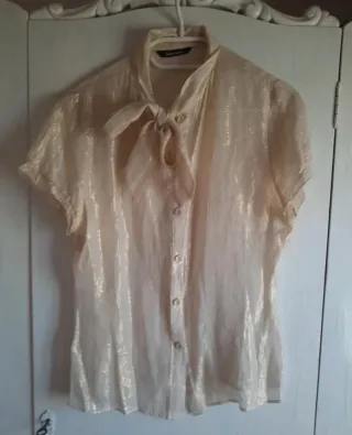 Blusa con lazada al cuello, Tintoretto