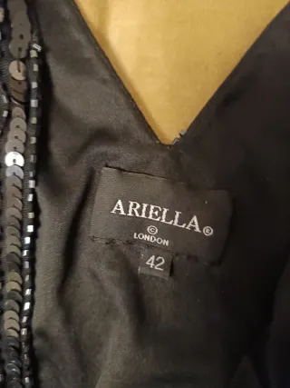 Traje de noche negro y plateado