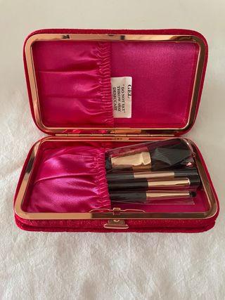 Neceser de maquillaje rojo y dorado