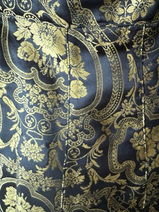 Falda de fiesta negra y dorada