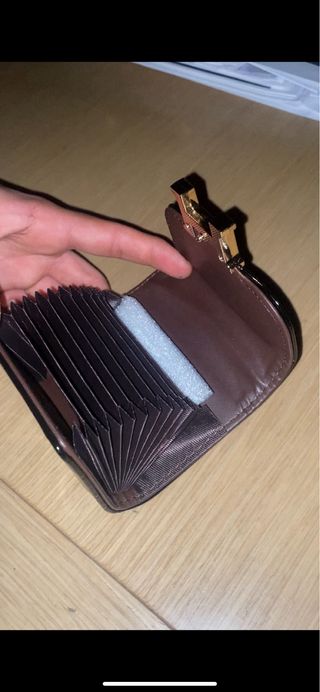 Monedero Hermès Negro y Dorado