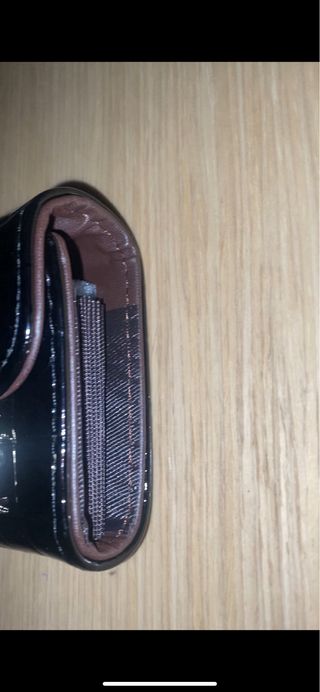 Monedero Hermès Negro y Dorado