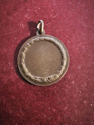 Medaglia in bronzo con figura alata