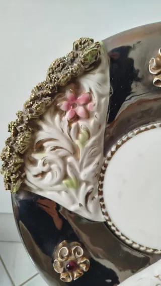 Piatto sottovaso decorato