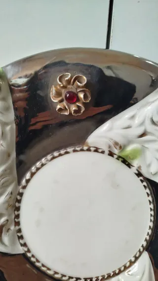 Piatto sottovaso decorato