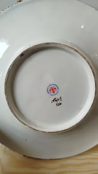 Piatto sottovaso decorato