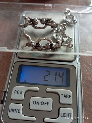 Orecchini G. Raspini Angioletti acrobati Arg. 925