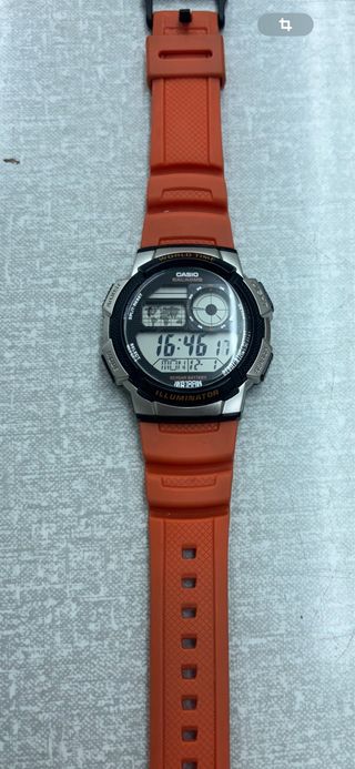 Reloj Casio Naranja y Plateado