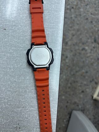 Reloj Casio Naranja y Plateado