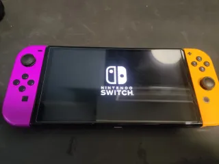 Nintendo Switch OLED Viola/Arancione