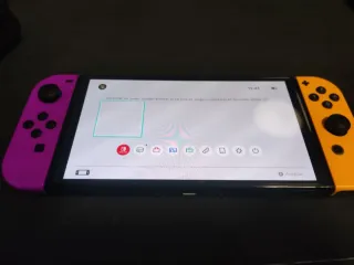 Nintendo Switch OLED Viola/Arancione