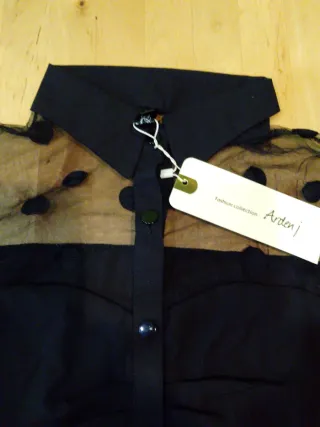 Blusa transparente de lunares