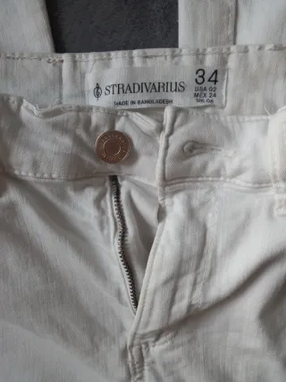 Pantalones Stradivarius mujer beige y blanco