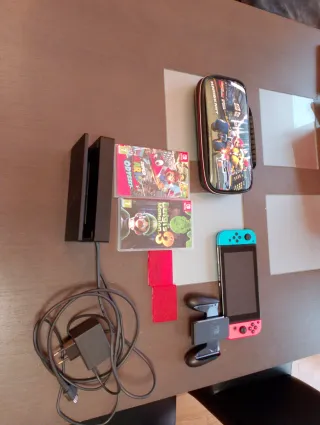 Nintendo Switch con 2 juegos y maletín