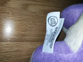 Peluche interactivo de perro morado