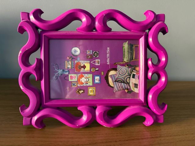 Cornice decorativa fucsia per foto