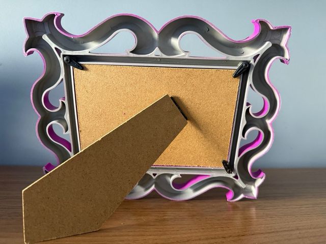 Cornice decorativa fucsia per foto