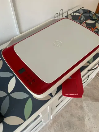 Impresora HP Roja y Blanca