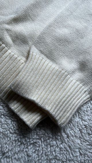 Jersey beige con corazón roto