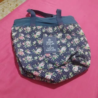 Borsa floreale blu e rosa