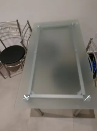 Tavolo in cristallo con 4 sedie