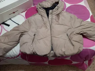 Plumífero beige nuevo