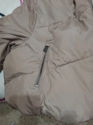 Plumífero beige nuevo