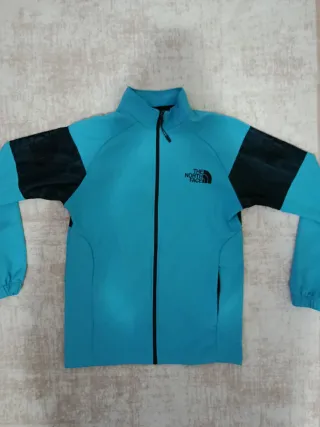 Sudadera The North Face azul y negra