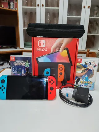 Nintendo Switch OLED Blu/Rosso + GIOCHI