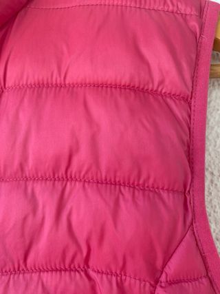 chaleco plumas fucsia bolsillos