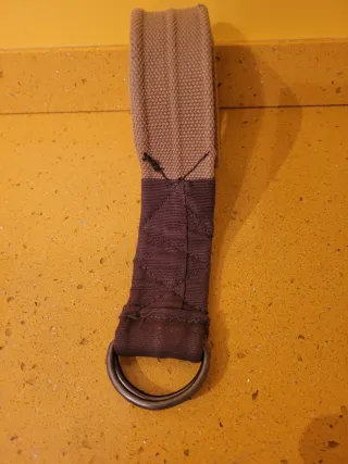 Cinturón tela beige con león talla 100