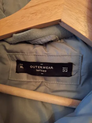 Cazadora mujer con capucha azul