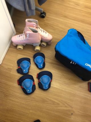 Patines rosas con bolsa y protectores