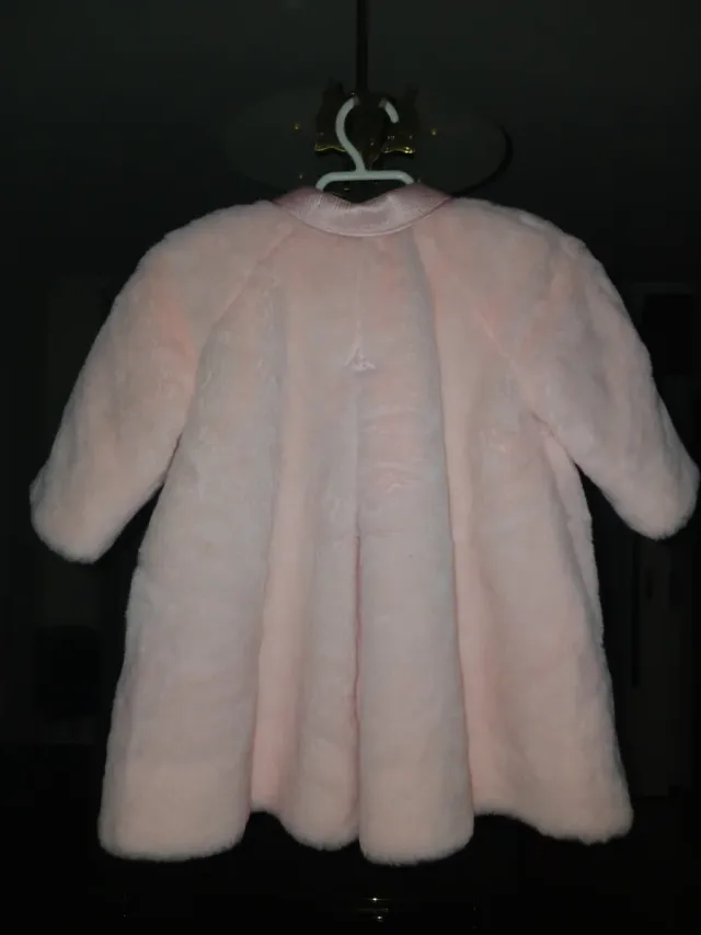 Abrigo rosa T.1 año