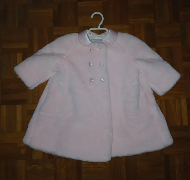 Abrigo rosa T.1 año