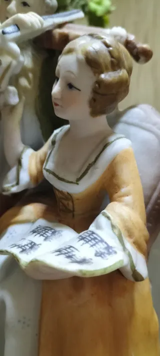 Figurita pareja músicos porcelana