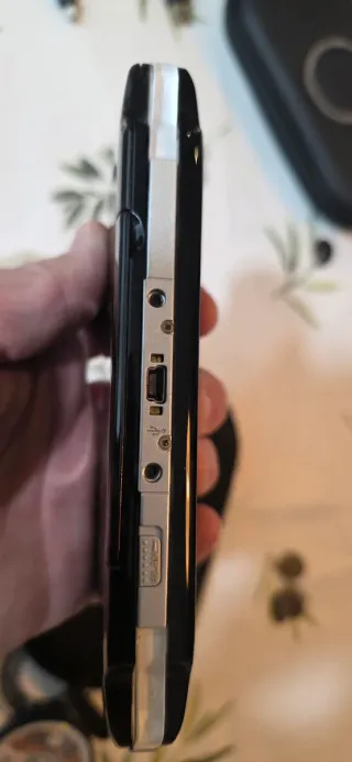 PSP Sony Negra + 4 juegos UMDs