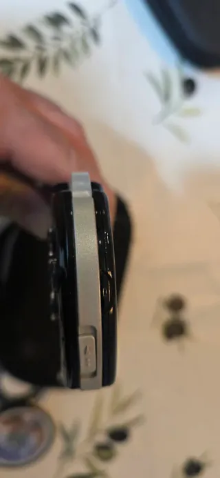 PSP Sony Negra + 4 juegos UMDs