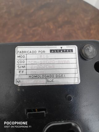 Teléfono Alcatel Negro, vintage.