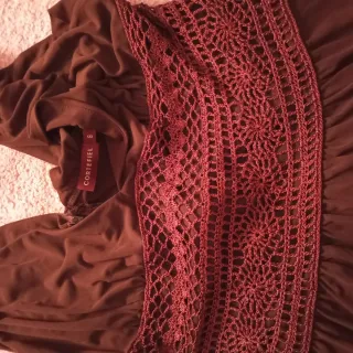 Es un vestido verde talla G