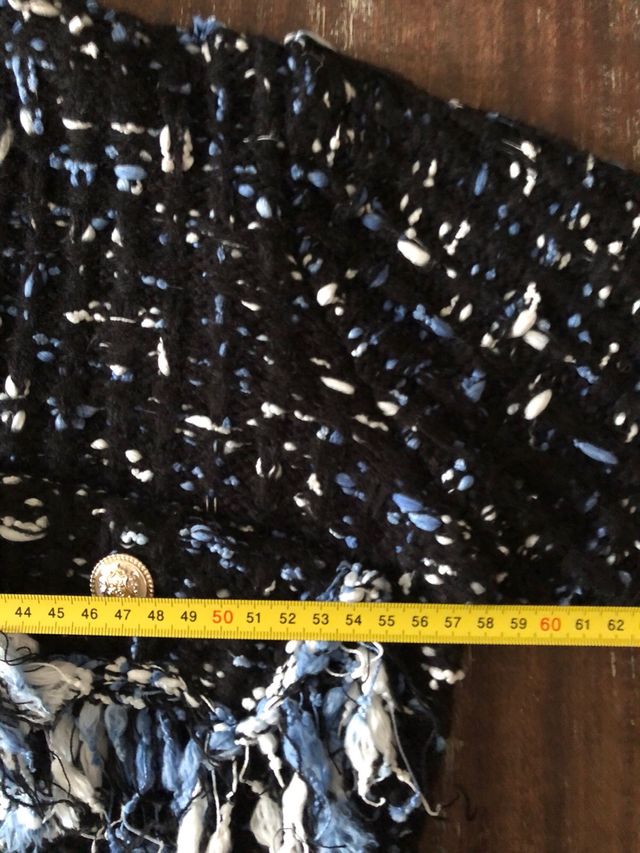 Cárdigan tweed negro con flecos