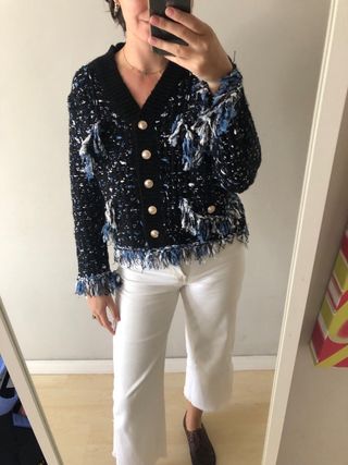 Cárdigan tweed negro con flecos