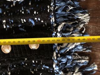 Cárdigan tweed negro con flecos