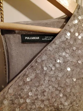 Vestido corto lentejuelas plateado .elastico